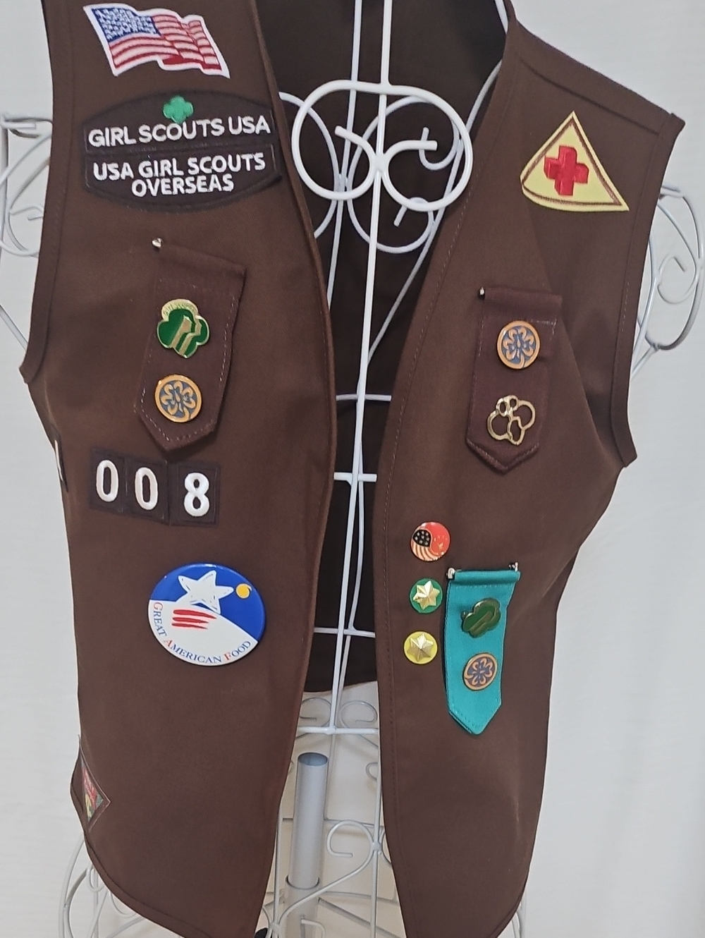 Brown Girl Scouts Vest with Assorted Patches & Pins
